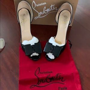 Christian Louboutin black patent leather heels.